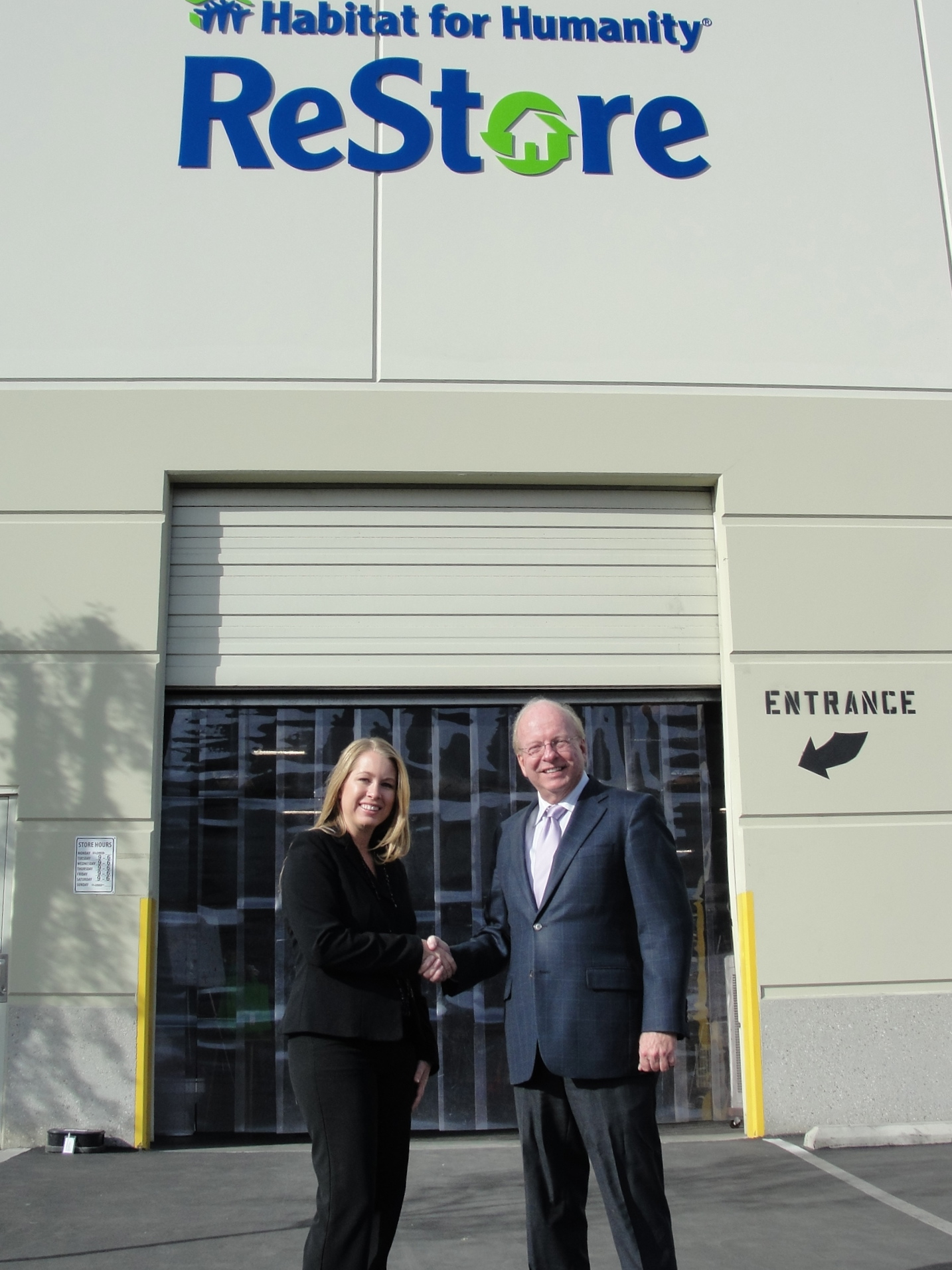 Rhea Stumm is the new ReStore manager.  She is welcomed by Dennis Baxter, executive director of Habitat for Humanity San Bernardino Area, Inc.  
