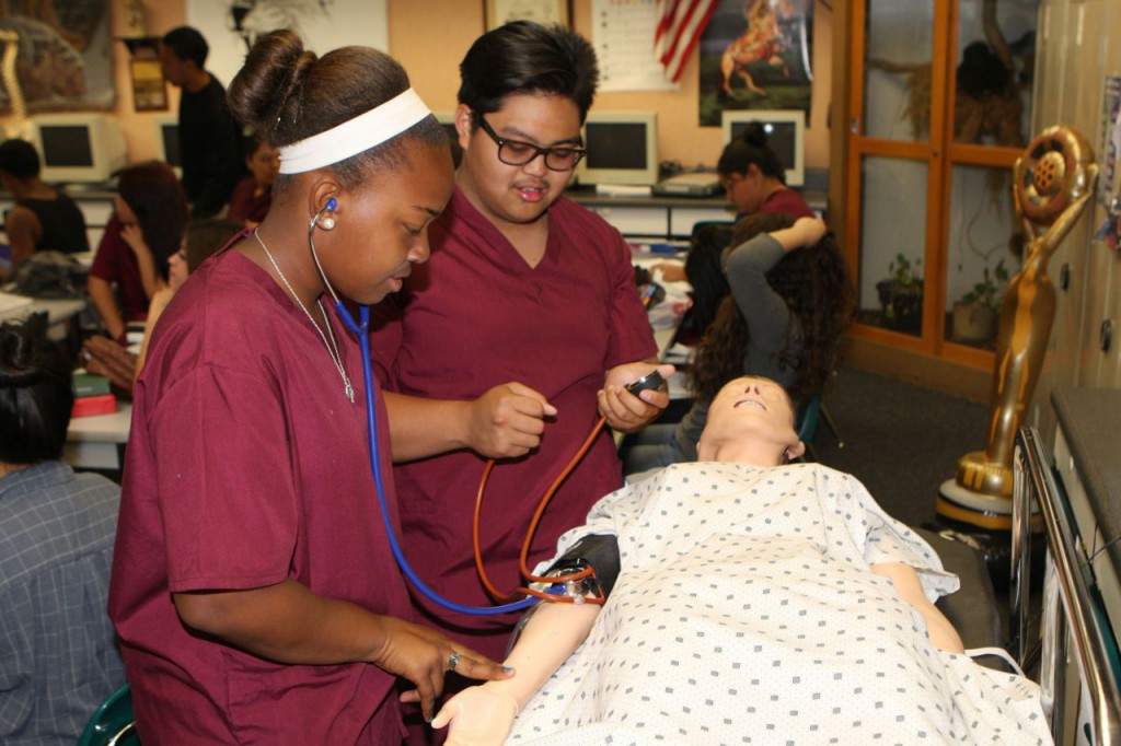 Canyon Springs Health Careers Academy  students with the simulation Makiken “Annie” are Agienna Lewis and Anthony Ordinario