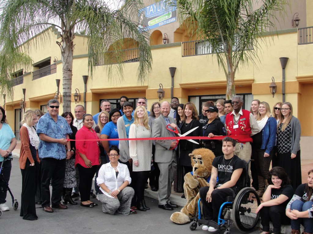 Community leaders and Taylion leaders cut the Ribbon at the new Taylion Academy in San Bernardino. 
